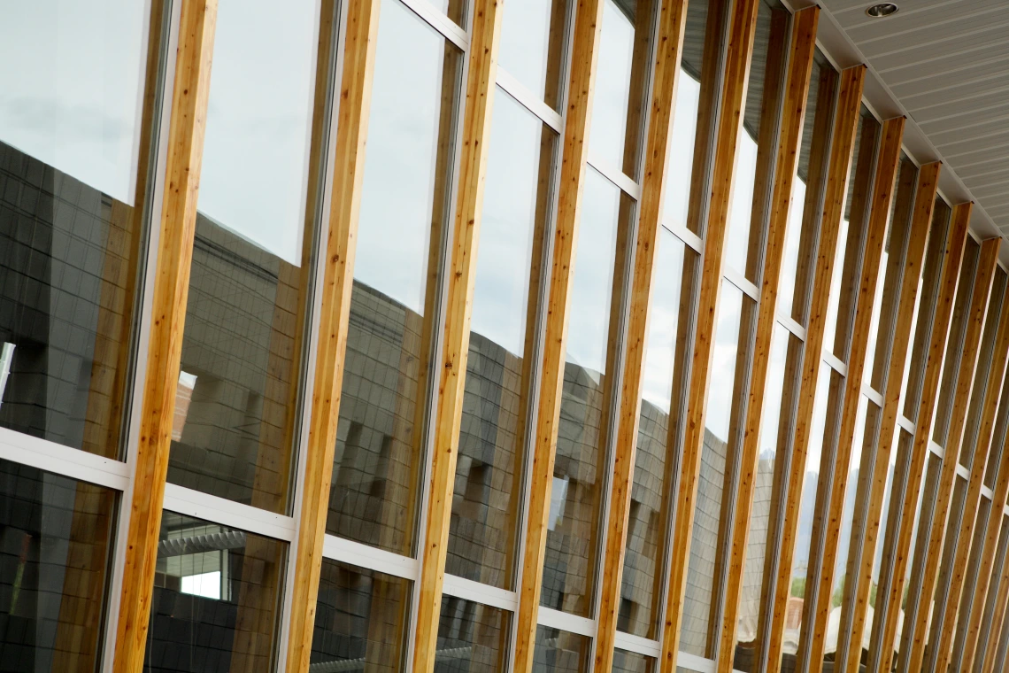 Windows separated by beams of wood